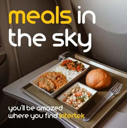 A meal tray on a passenger plane
