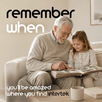 An old gentleman showing photos in an album to a young girl
